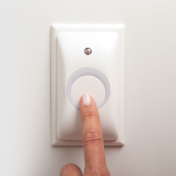 Light switch with a finger pressing it, accompanied by text on installation and use.